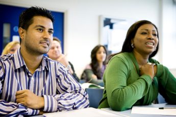 Individuals in a Meeting