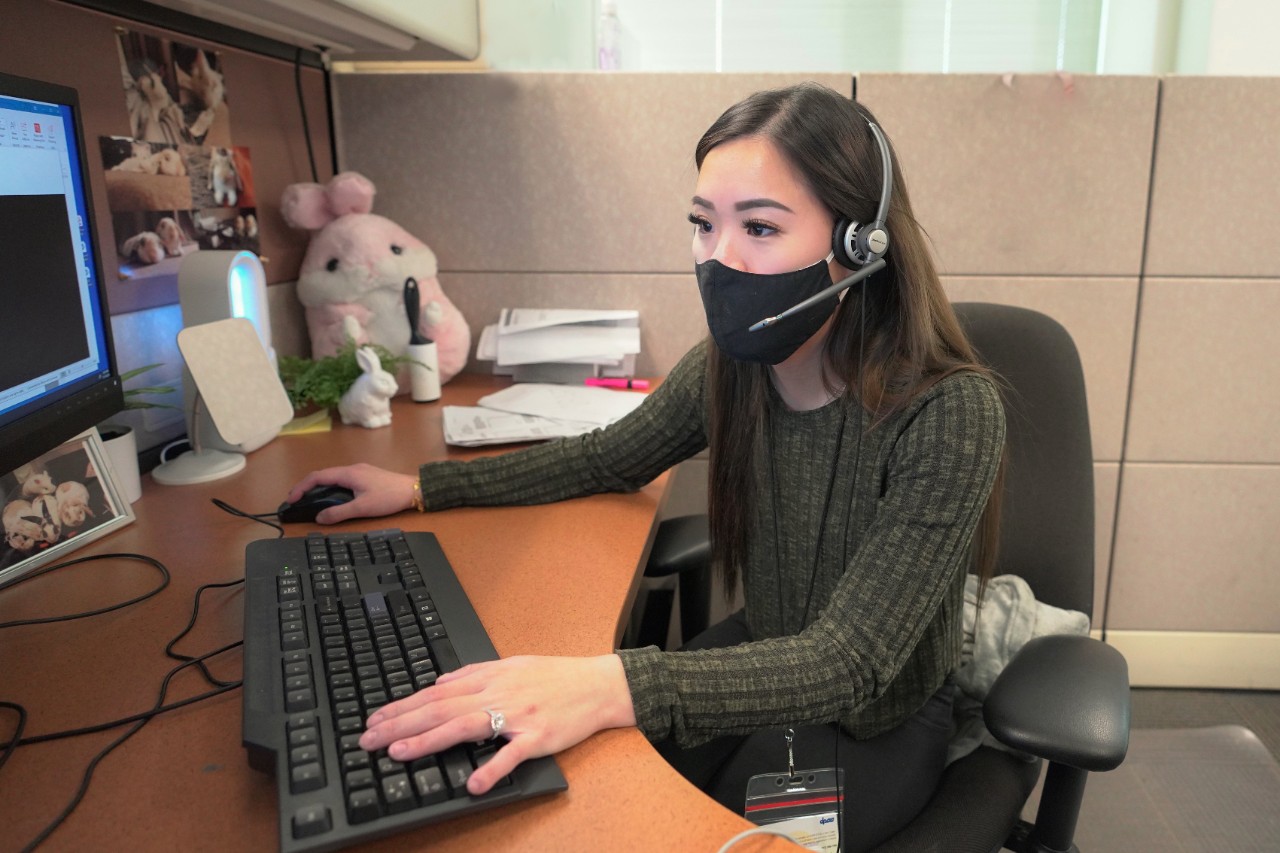 DPSS Employee answering phone calls at theCustomer Service Center (CSC).